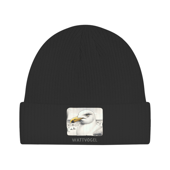 Beanie Nordsee Möwe mit Strand und Touristen im Hintergrund