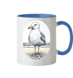 Tasse zweifarbig mit Motiv Möwe am Strand Nordsee